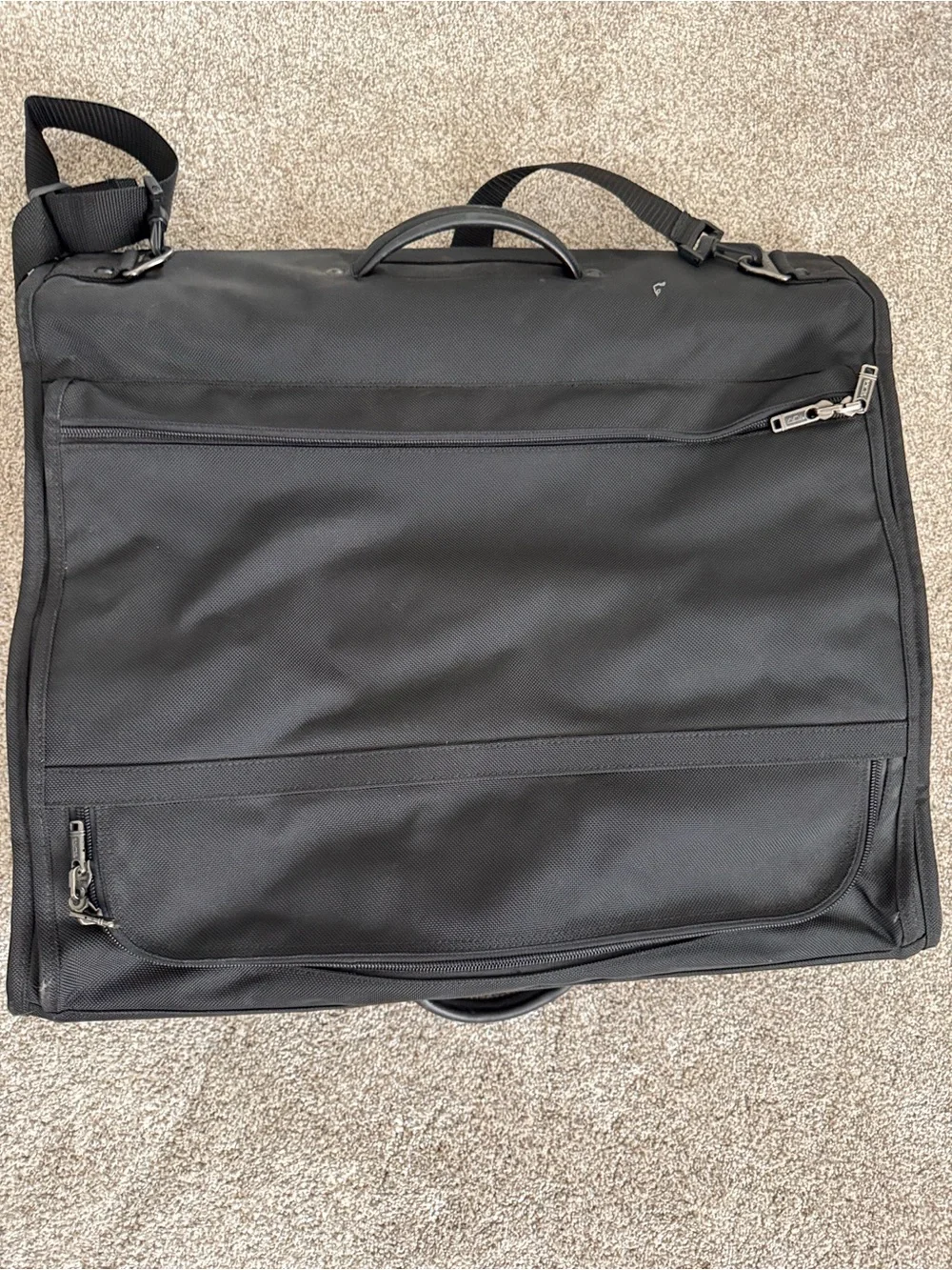 Tumi Bifold Black Travel Garment Bag with Multiple Front Pockets